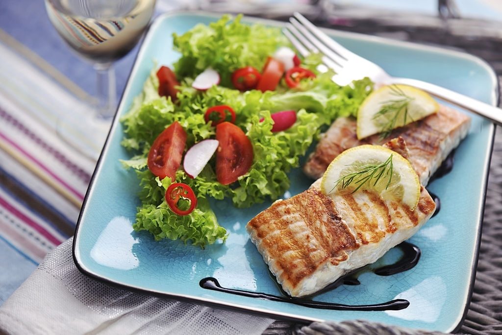 Grilled Salmon Steak With Fresh Salad And Balsamic Vinegar Sauce